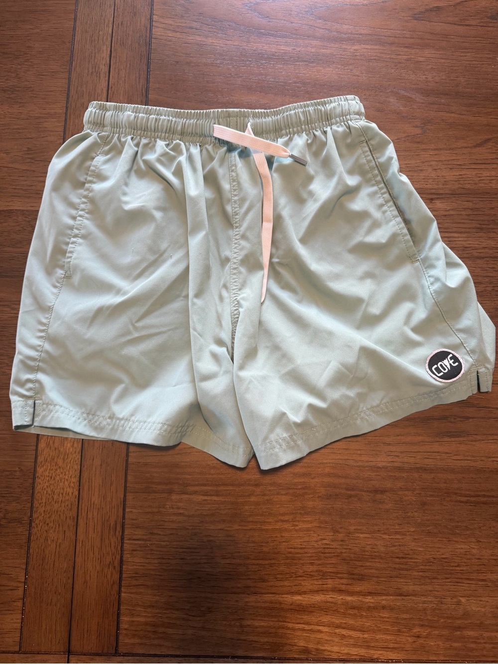 Cove Men’s Sage Green Swim Trunks with Pink Drawcord